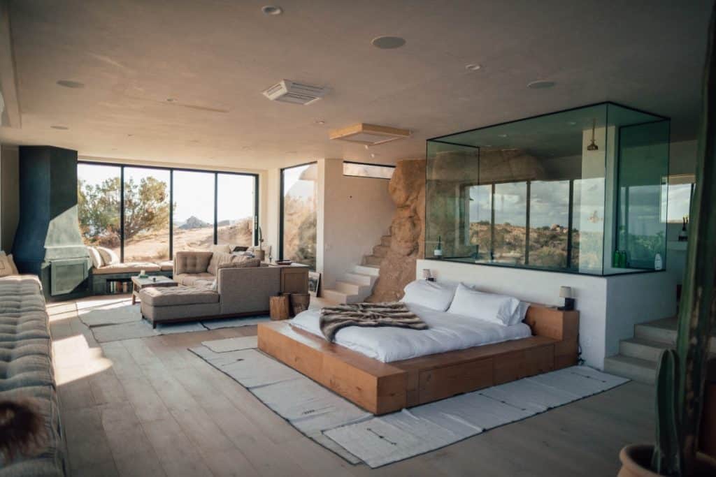 bedroom-with-shower-behind-and-view-of-desert